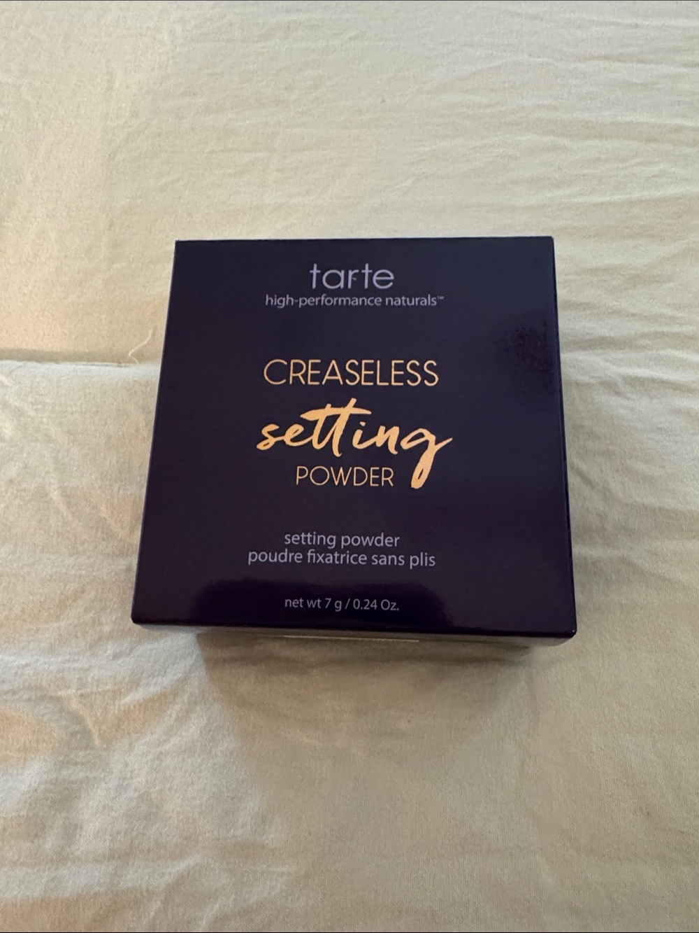 Lavender tarte Creaseless Setting Powder - Deep Plum with Gold Lettering